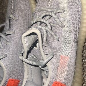 Yeezy Gray and Orange Athletic Shoes